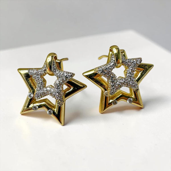 Χρυσά σκουλαρίκια αστέρια με λαμπερά ζιργκόν