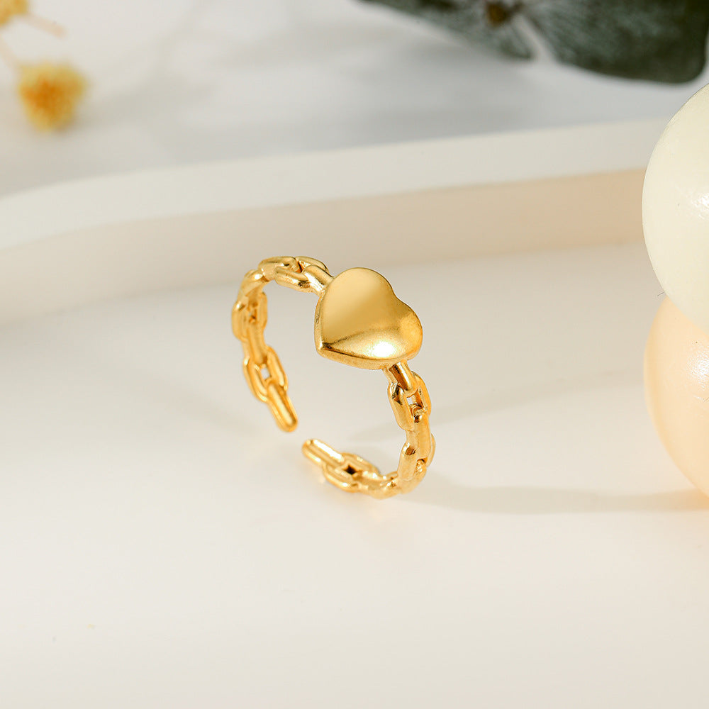 Ατσάλινο επιχρυσωμένο δαχτυλίδι με καρδιά και σχέδιο αλυσίδας