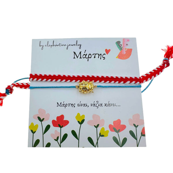 Μαρτάκι Βραχιόλι με Κόκκινη-Λευκή Πλεξούδα & Μπλε Κορδόνι με Χρυσή Πασχαλίτσα – Παιδικό Χειροποίητο Γούρι