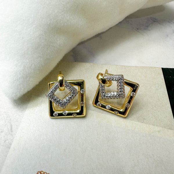 Χρυσά σκουλαρίκια rhombus με λαμπερά ζιργκόν