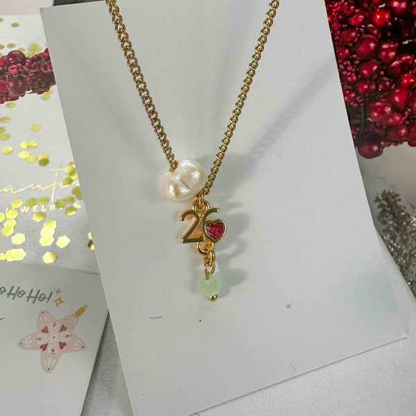 Κολιέ Γούρι 2026 με Καρδιά Σμάλτο, Μαργαριτάρι & Κρύσταλλο – Ατσάλινη Αλυσίδα