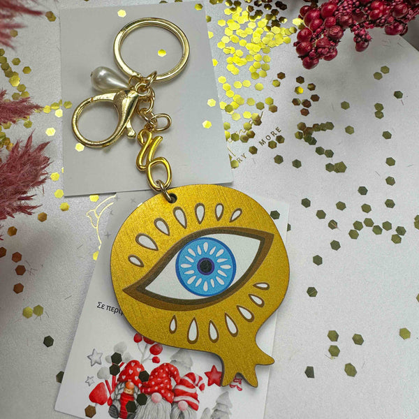 Μπρελόκ Γούρι Ρόδι με Μάτι – Χρυσό ξύλινο 2026