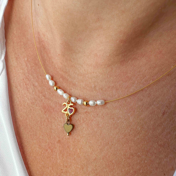 Γούρι Κολιέ 2026 με Μαργαριτάρια Rice & Αιματίτη Καρδιά σε Επίχρυσο Ατσαλόσυρμα