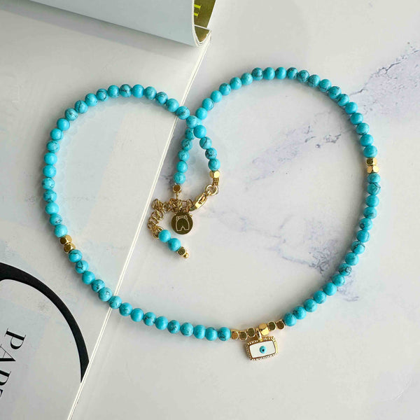 Κολιέ από ημιπολύτιμες πέτρες & κρεμαστό μάτι με σμάλτο