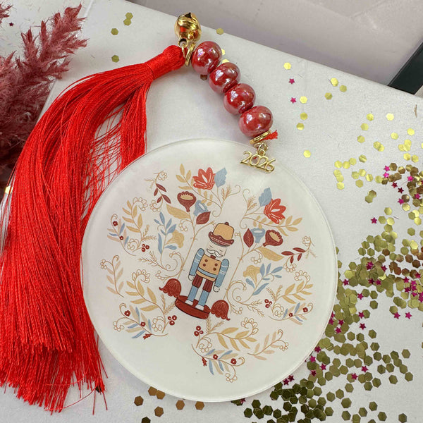 Γούρι Καρυοθραύστης 2026 – Plexiglass με Μεταξωτή Φούντα & Κεραμικές Χάντρες