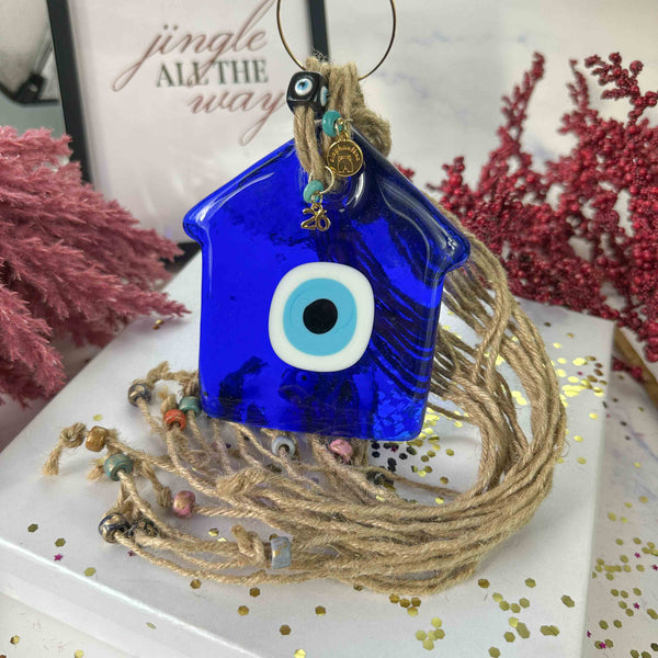 Γούρι 2026 – Γυάλινο Σπίτι Μπλε Με Μάτι, Σχοινιά & Χάντρες