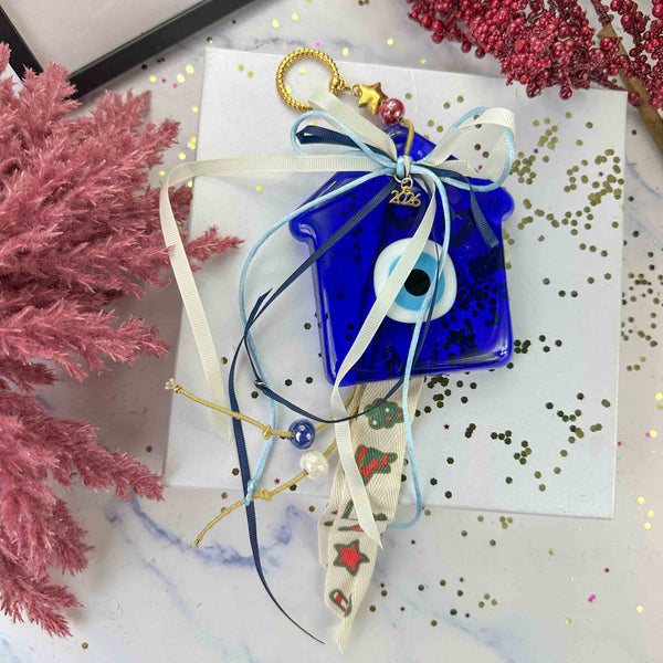 Γούρι 2026 – Γυάλινο Σπίτι Μπλε Με Μάτι, Κορδέλες & Χάντρες