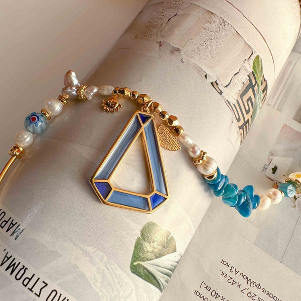 Κολιέ με mix μαργαριτάρια,κρύσταλλα και στοιχείο μπλε βιτρώ