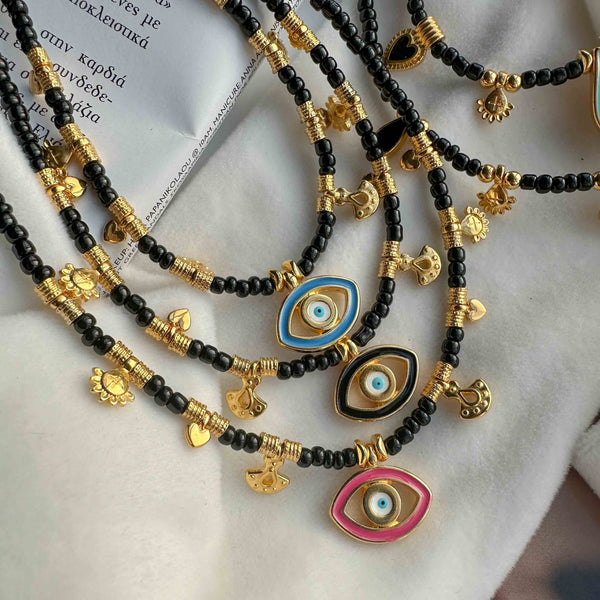 Χειροποίητο Κολιέ με Κεραμικές Χάντρες και Ματάκι με Σμάλτο