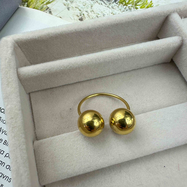 Ατσάλινο επιχρυσωμένο δαχτυλίδι με δύο σφαίρες