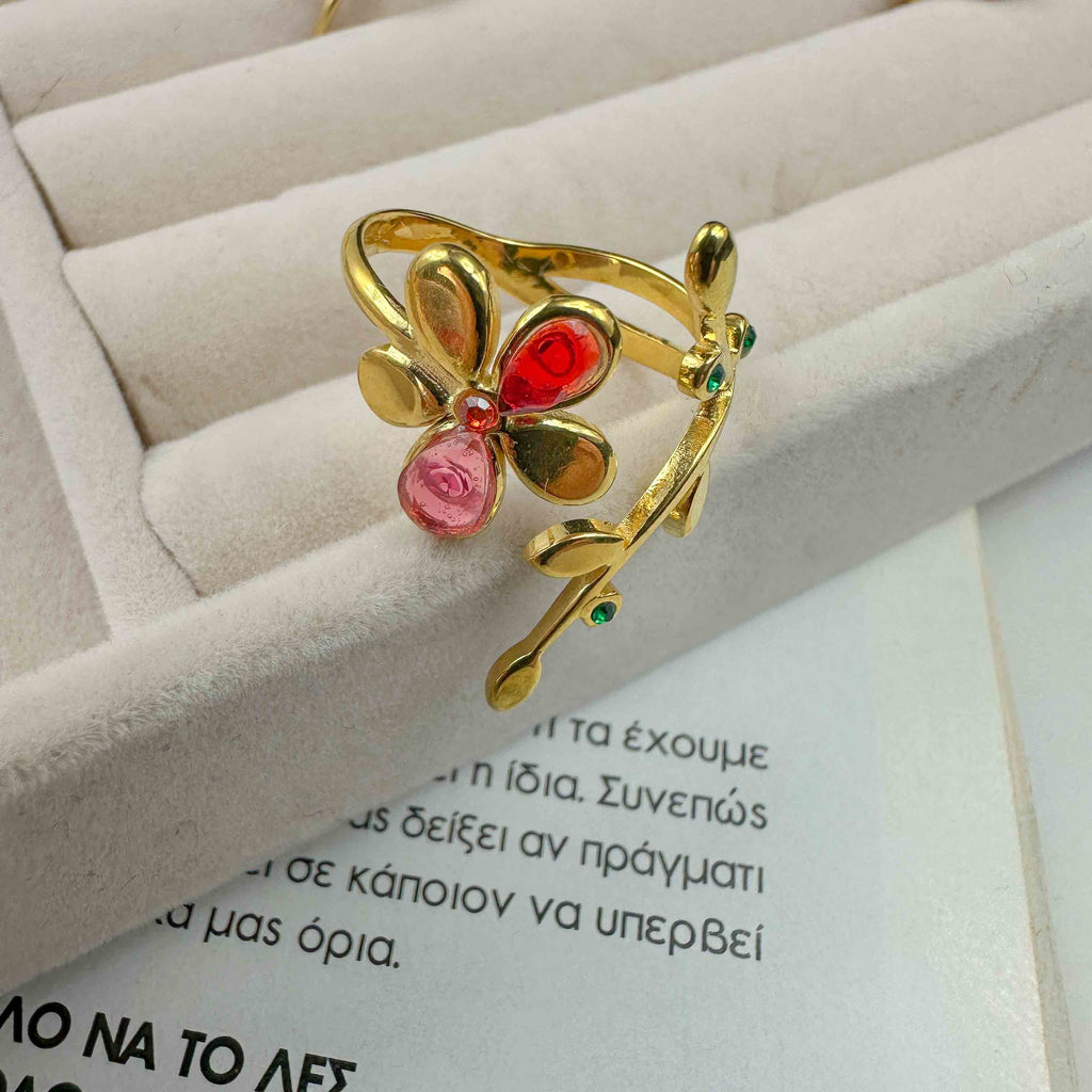 Ατσάλινο επιχρυσωμένο δαχτυλίδι με λουλούδι και πολύχρωμες λεπτομέρειες