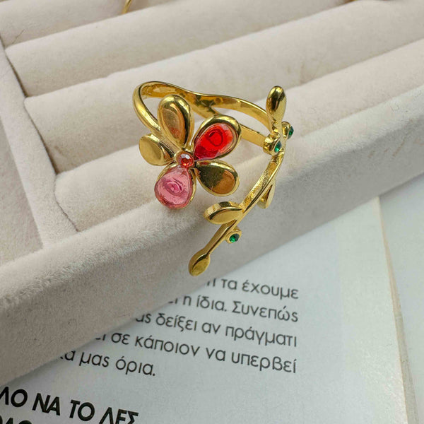 Ατσάλινο επιχρυσωμένο δαχτυλίδι με λουλούδι και πολύχρωμες λεπτομέρειες