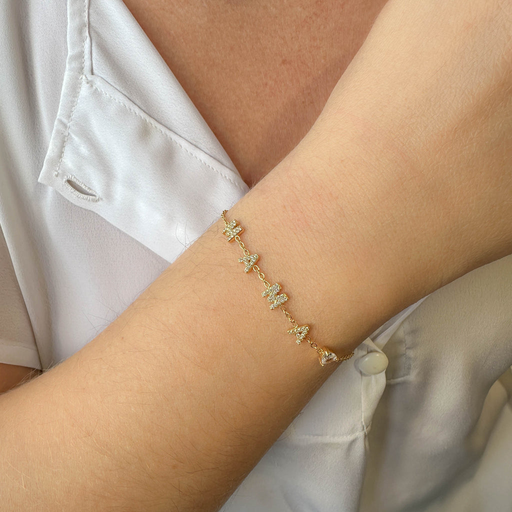 Χρυσό Βραχιόλι «ΜΑΜΑ» με Λευκά Κρύσταλλα – Κομψό & Συμβολικό Κόσμημα