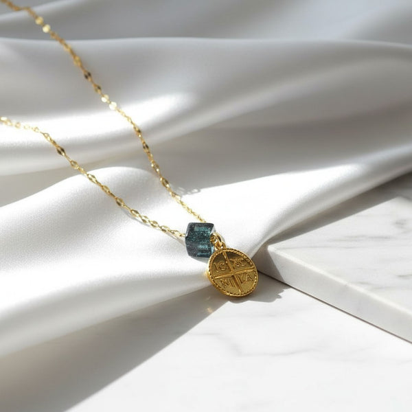 Elephantina gold plated necklace with a black stone and IC XC NIKA medallion. 24K gold plated stainless steel.
