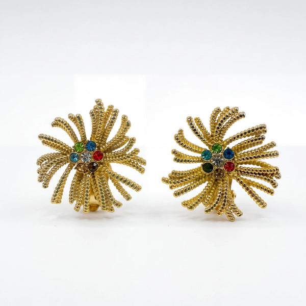 elephantina.gr gold-tone starburst clip-on earrings with multi-colored crystal accents in a textured metal design