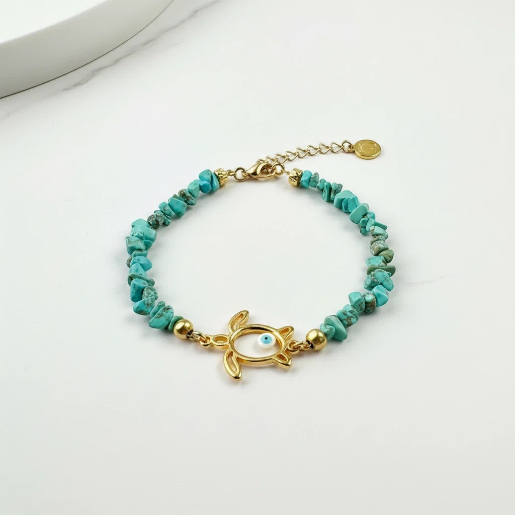 Elephantina.gr gold turtle anklet with turquoise chips and evil eye detail. Handmade jewelry.