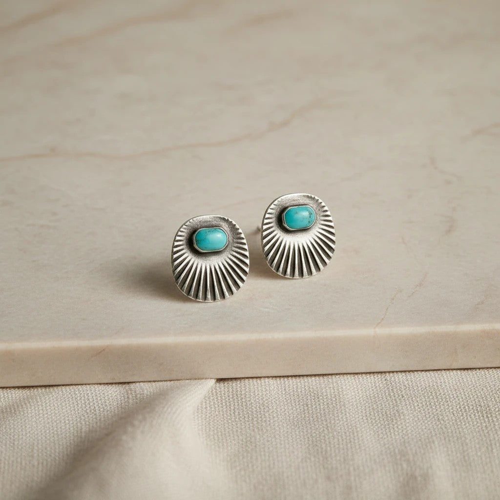 Oval sterling silver earrings with turquoise center and sunburst design by elephantina.gr