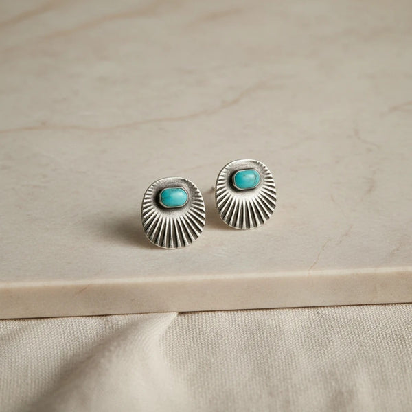 Oval sterling silver earrings with turquoise center and sunburst design by elephantina.gr