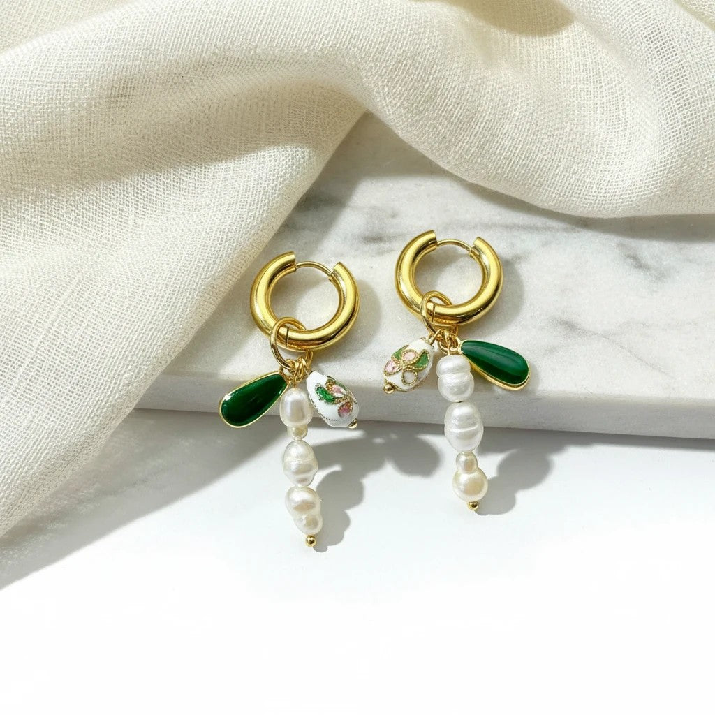 elephantina.gr gold hoop earrings with millefiori beads, green enamel drops, and white cultured barrel pearls.