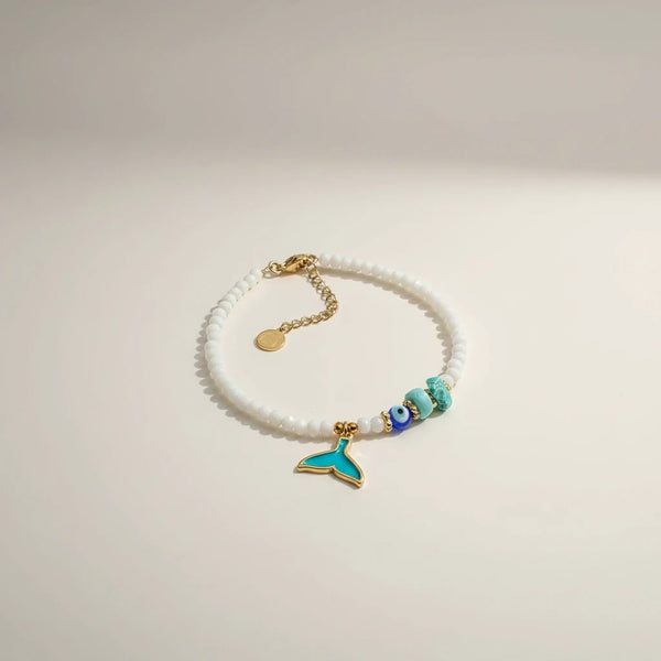 elephantina.gr white beaded anklet with turquoise mermaid tail and evil eye charm