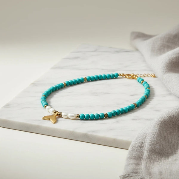 elephantina.gr turquoise beaded necklace with pearls and gold whale tail charm, 40cm + 5cm extension