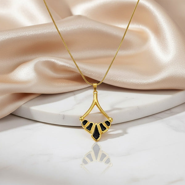 elephantina.gr gold plated brass Art Nouveau pendant necklace with black enamel detail and snake chain.