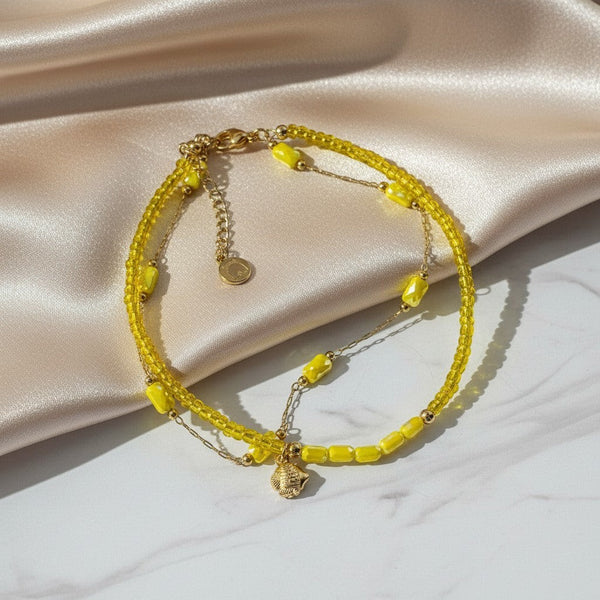 Elephantina.gr yellow beaded anklet with crystal accents and fish charm. Boho chic summer jewelry.
