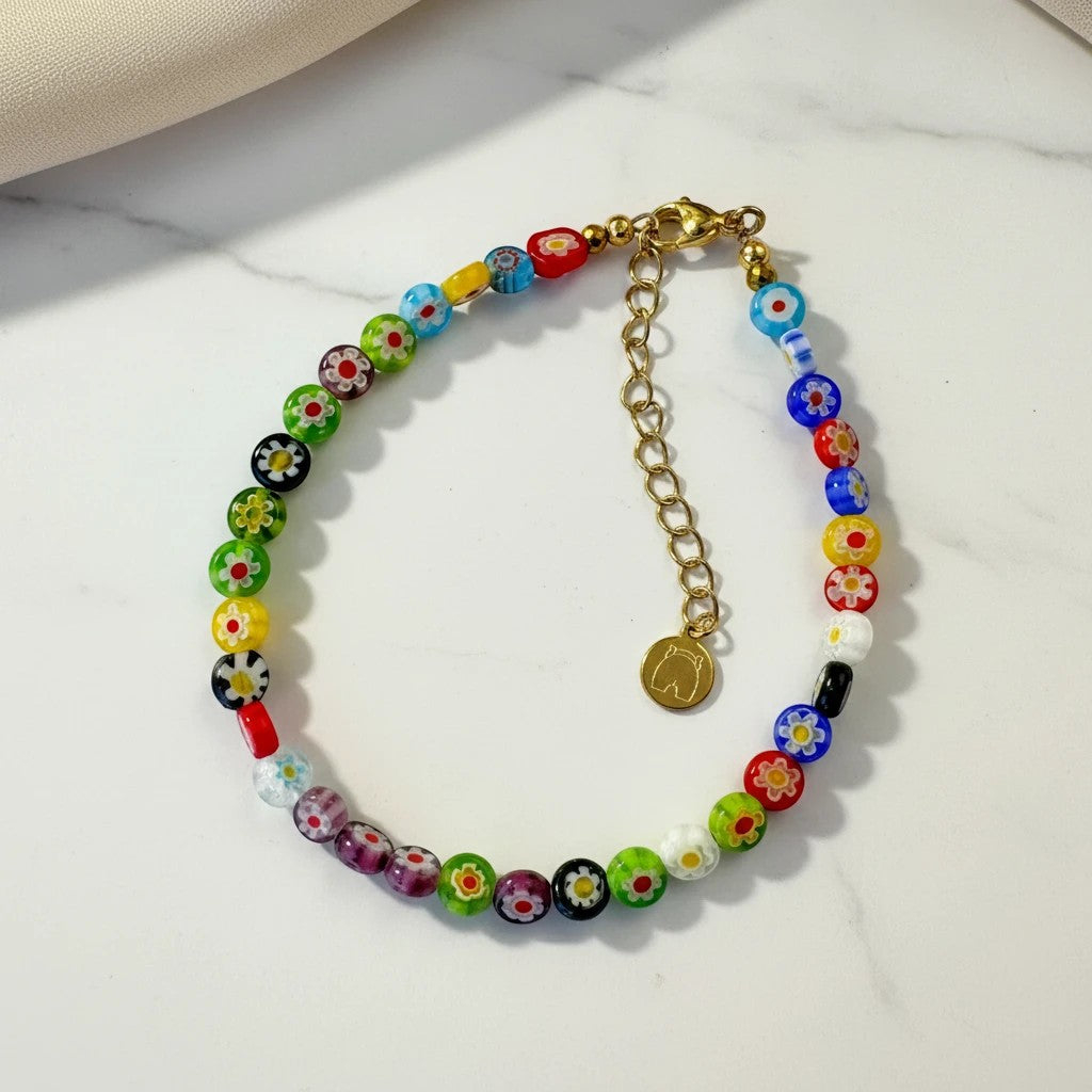 Colorful elephantina.gr millefiori bead anklet with gold chain and clasp. Playful summer jewelry.