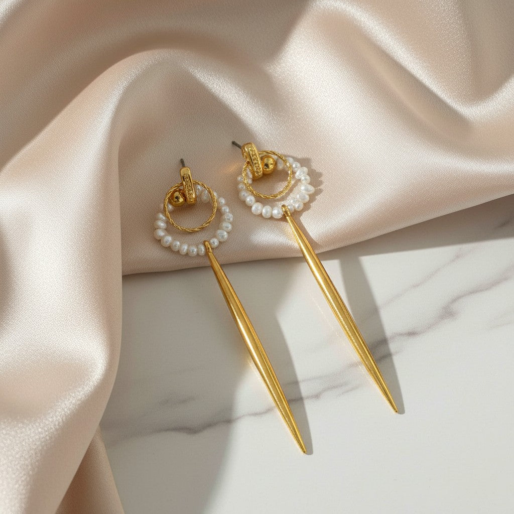 elephantina.gr gold long drop earrings with pearls and textured hoops. Elegant and feminine.