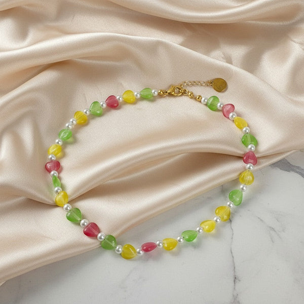 Elephantina.gr multi-colored heart-shaped cat eye stone and pearl beaded necklace with gold clasp.
