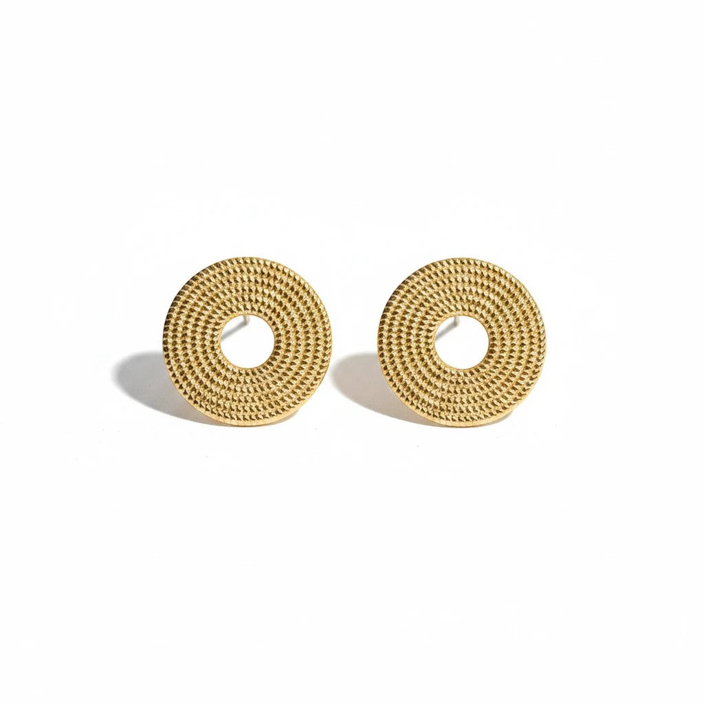 elephantina.gr 24K gold-plated brass stud earrings with a textured circular design and hypoallergenic titanium posts.