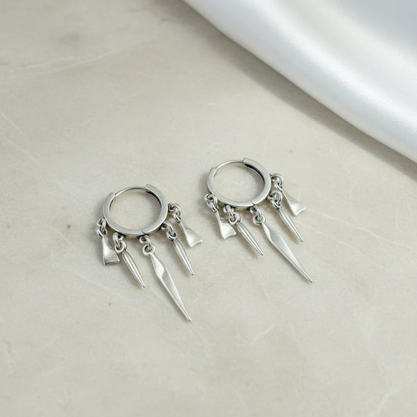 elephantina.gr silver hoop earrings with dangling spikes, 3cm length. Modern, dynamic design.
