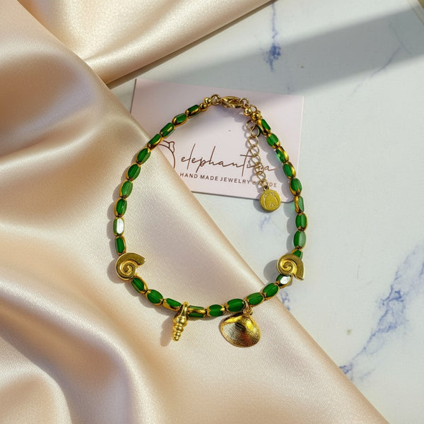 elephantina.gr green glass bead anklet with gold seashell and spiral charms