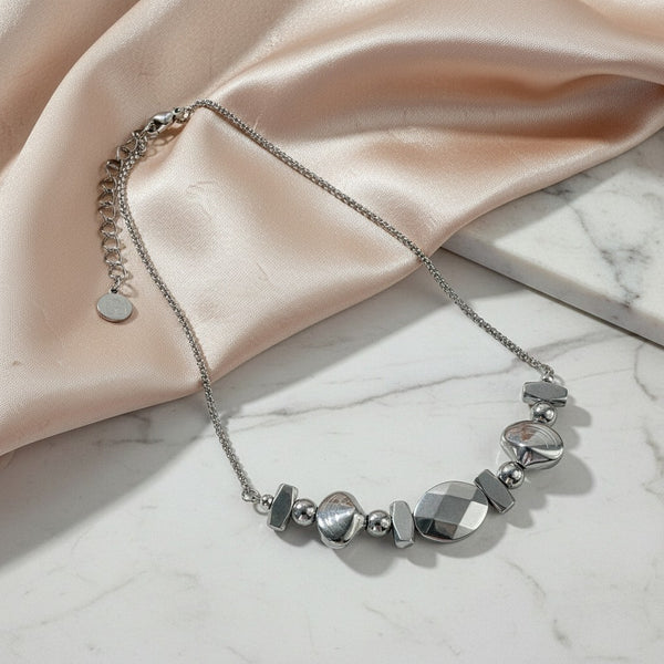 Silver hematite necklace with steel chain by elephantina.gr. Features geometric shapes and a modern, minimal design.