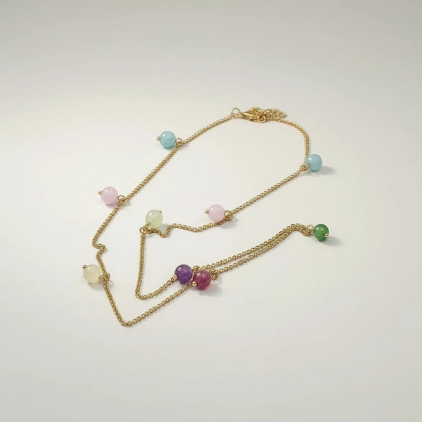elephantina.gr gold-plated stainless steel chain necklace with colorful agate beads in pastel shades and amethyst, ruby, and jade.
