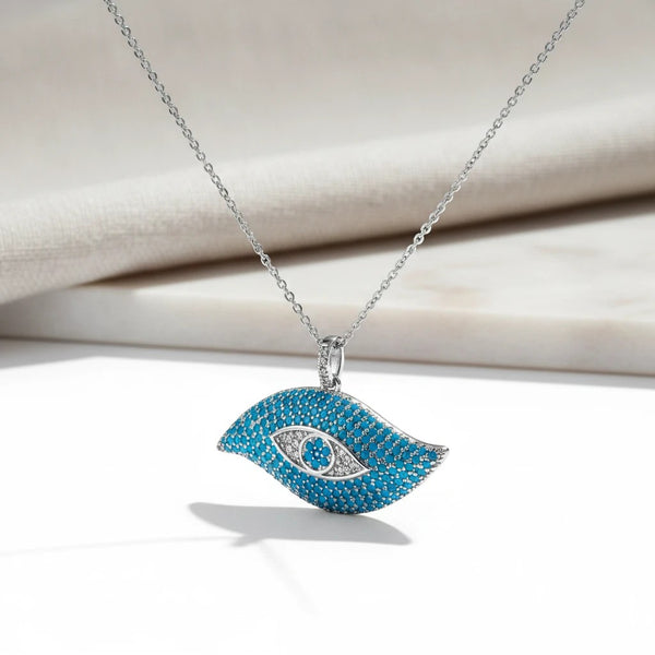 Elephantina.gr Evil Eye pendant necklace with turquoise stones and white cubic zirconia accents on a silver-tone chain.