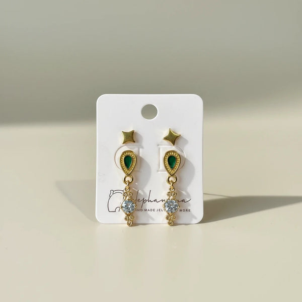 Elephantina.gr gold plated teardrop earrings with emerald green stones and clear cubic zirconia dangle, plus star studs.