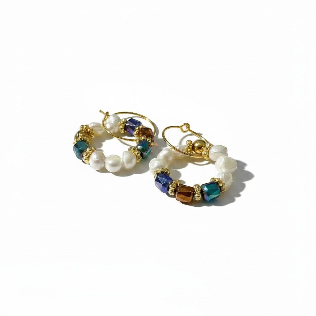 elephantina.gr gold hoop earrings featuring white cultured pearls and vibrant multi-colored crystals.