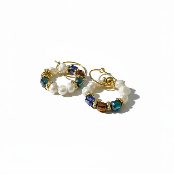 elephantina.gr gold hoop earrings featuring white cultured pearls and vibrant multi-colored crystals.
