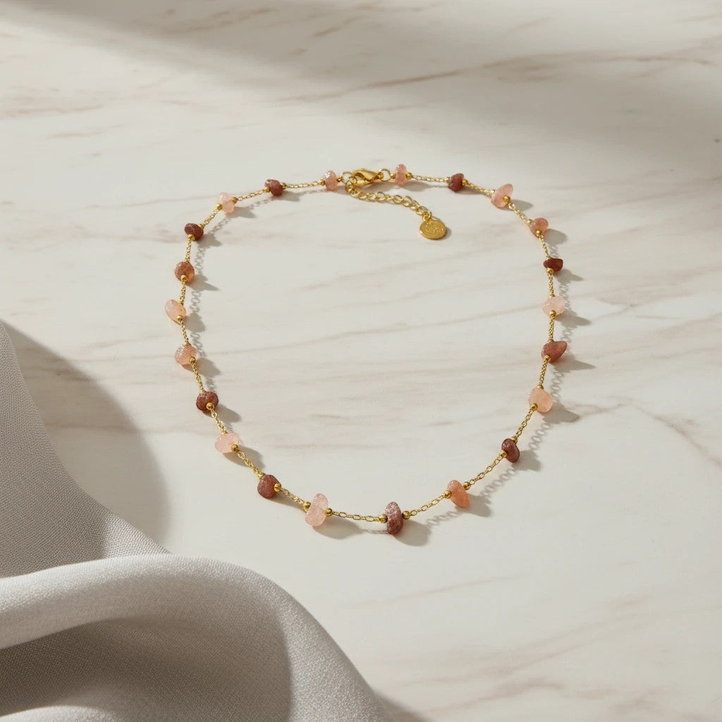 elephantina.gr gold chain necklace with scattered pink and brown gemstone chips and adjustable clasp