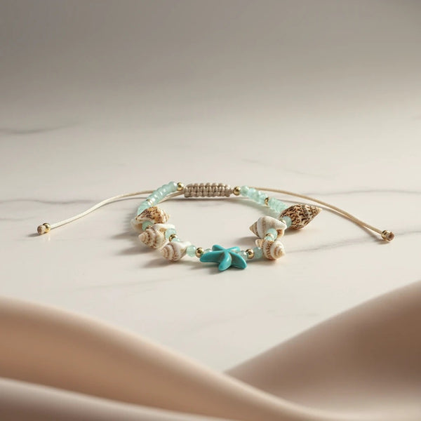 Elephantina.gr blue starfish and shell anklet with crystals and 24K steel clasp. Beachy, ocean-inspired jewelry.
