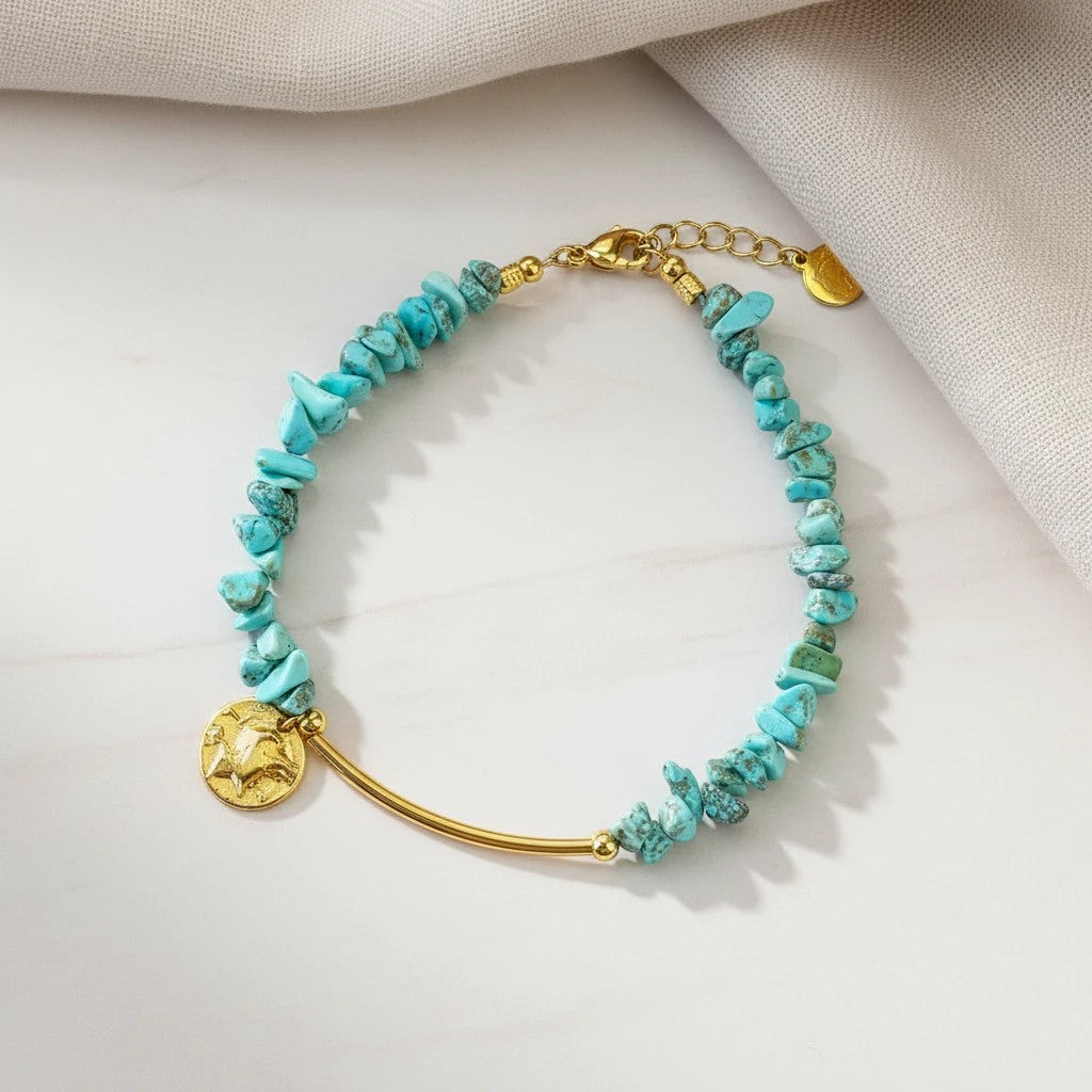 Elephantina.gr boho anklet with turquoise chips and gold-plated bar, featuring a coin charm.