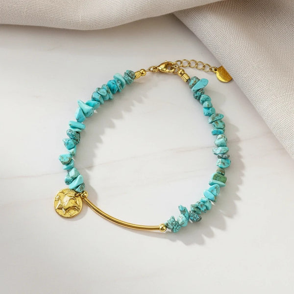 Elephantina.gr boho anklet with turquoise chips and gold-plated bar, featuring a coin charm.