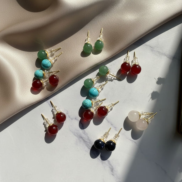 elephantina.gr stud earrings with green aventurine, turquoise, carnelian, rose quartz, and blue sandstone beads