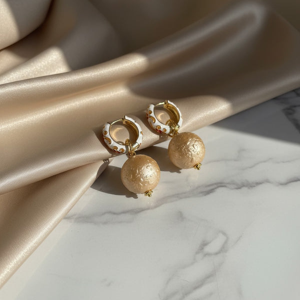elephantina.gr white cloisonné hoop earrings with red floral detail and large pearl-like bead