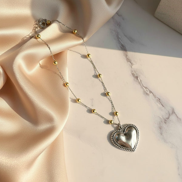 elephantina.gr silver heart pendant necklace with gold beads on a stainless steel chain