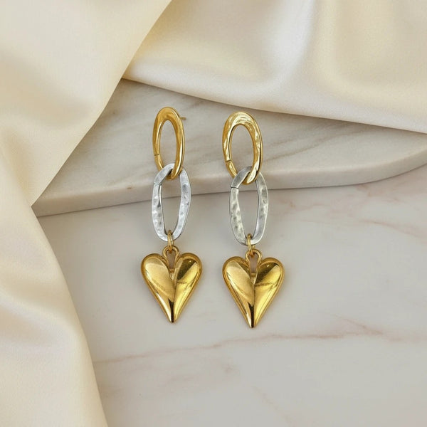 Elephantina.gr two-tone brass dangle earrings with oval links and gold heart charms, 9cm length.