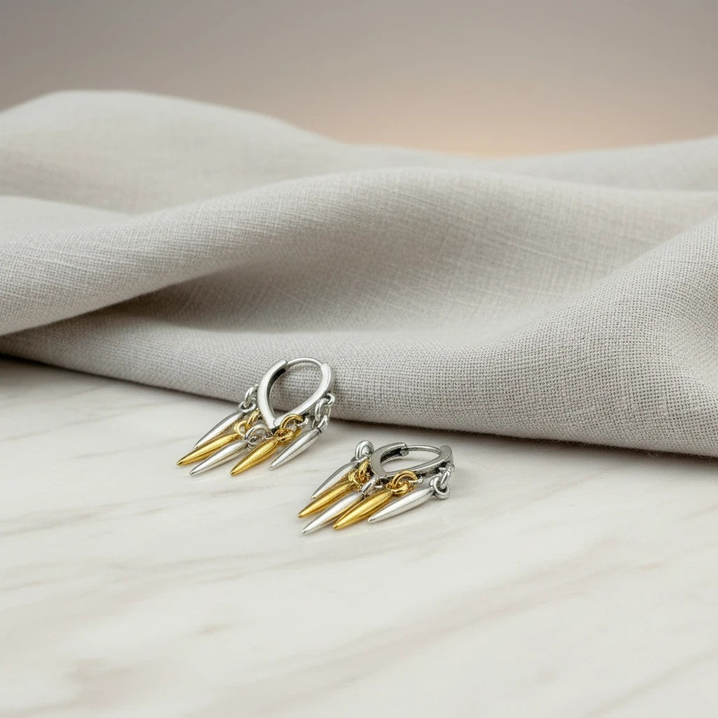Elephantina.gr two-tone hoop earrings with dangling spikes in silver and gold, 3cm length.