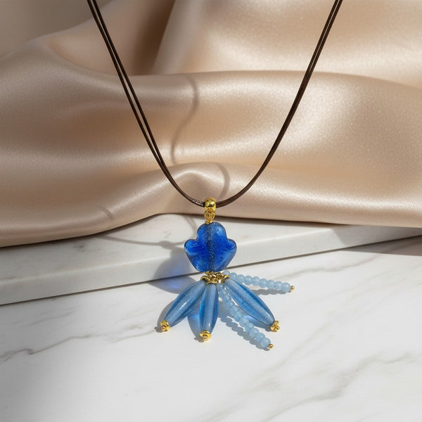 elephantina.gr handmade blue Murano glass, crystal, and semi-precious stone boho necklace with leather cord.