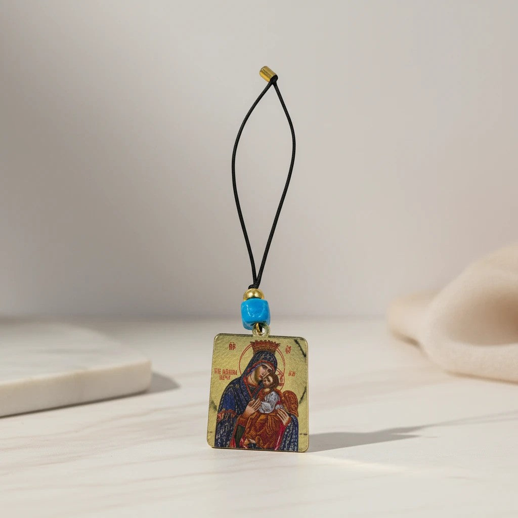 elephantina.gr religious icon pendant with Virgin Mary and Child, blue bead, gold-tone finish, black cord.